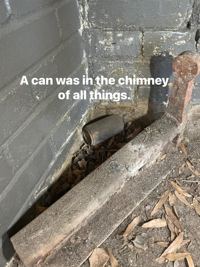 A discarded can and leaves found inside a dirty fireplace during a chimney cleaning by Southern Chimney and Duct Clean in Monroe, LA.