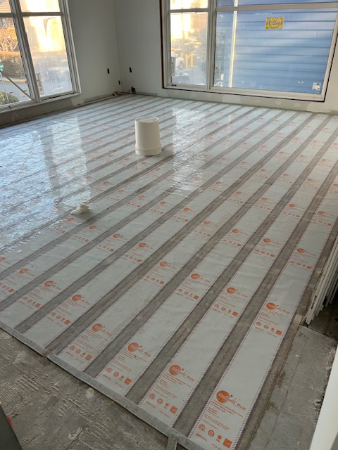 Carbonic Heat radiant floor heating system being installed in a home in Lake Hopatcong, NJ