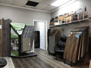 A showroom display featuring various carpet and flooring samples for selection at Gator Carpet and Tile in Jacksonville, FL.