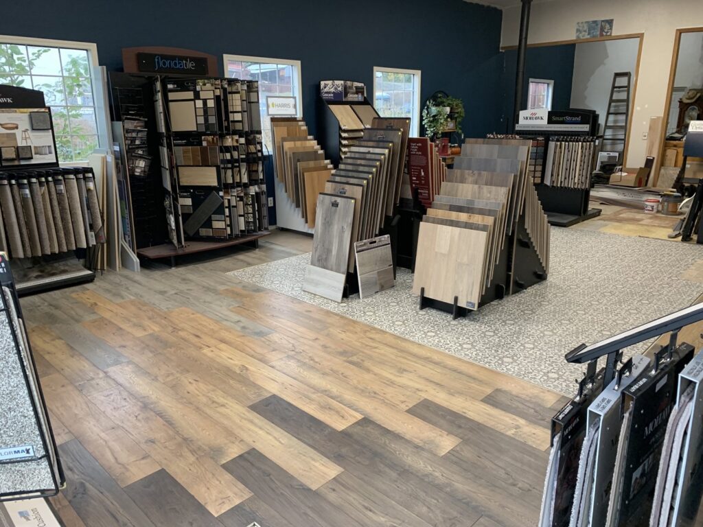 A comprehensive view of the Hale Flooring LLC showroom, featuring various carpet and flooring displays for customers in Kamiah, ID.
