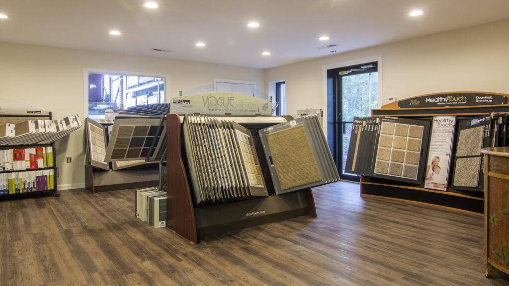 A showroom displaying various carpet and flooring samples at Get Steamed Carpet Cleaning, Inc. in North Charleston, SC.