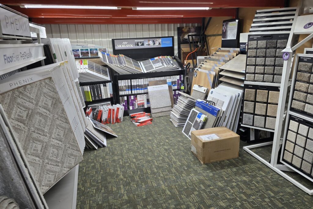 A showroom displaying various carpet and hardwood flooring options at M&S Flooring Inc. in Ardmore, TN.