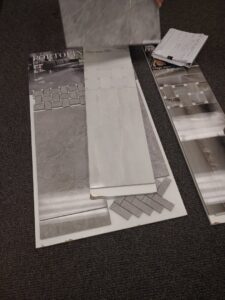 An interior view of the Palmetto Tile Columbia showroom in Columbia, SC, displaying both carpet and various tile options.