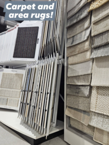 A display of various carpet and area rug samples at Flooring NuVo in Gretna, NE.