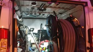 Hoses and professional carpet cleaning equipment stored in a service van for Cleaning Service Pro, LLC in Peoria, AZ