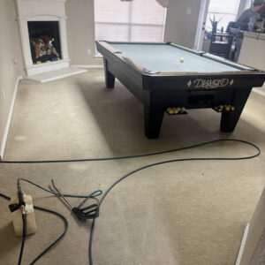 Carpet cleaning equipment set up in a room by Arise Carpet Cleaning in Kailua, HI.