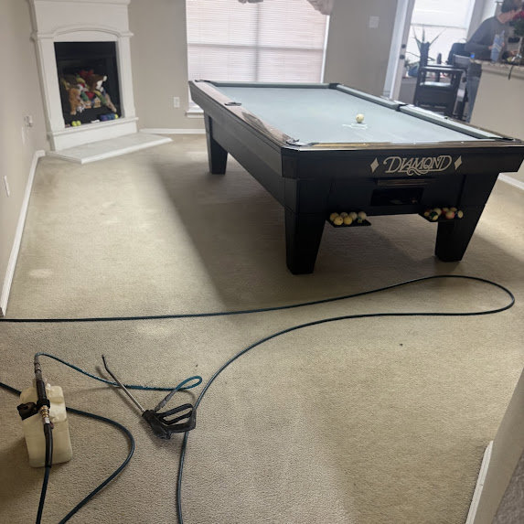 Carpet cleaning equipment set up in a room by Arise Carpet Cleaning in Kailua, HI.