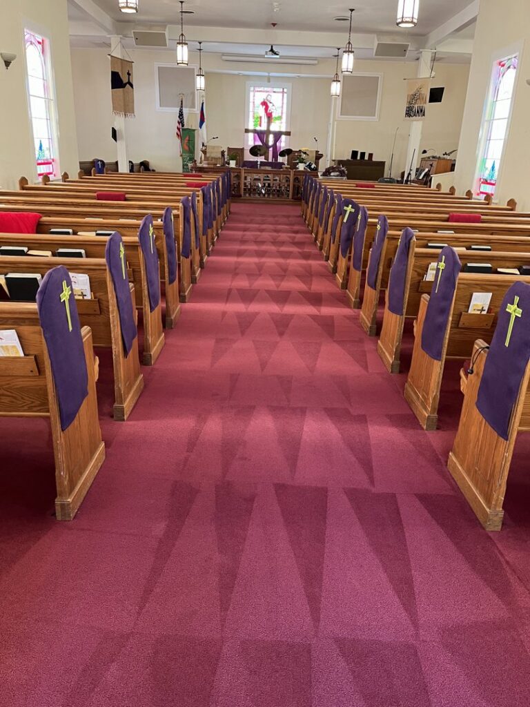 Professional carpet cleaning equipment, "The Butler System," inside a First Clean SC service van in North Charleston, SC.