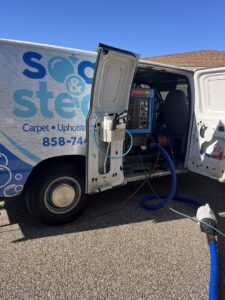 Professional carpet cleaning equipment loaded in a Soap & Steam Carpet Cleaning van in Raleigh, NC