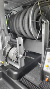 Hose reels for professional carpet cleaning equipment inside a service van for My Carpet Cleaner Nashville, TN