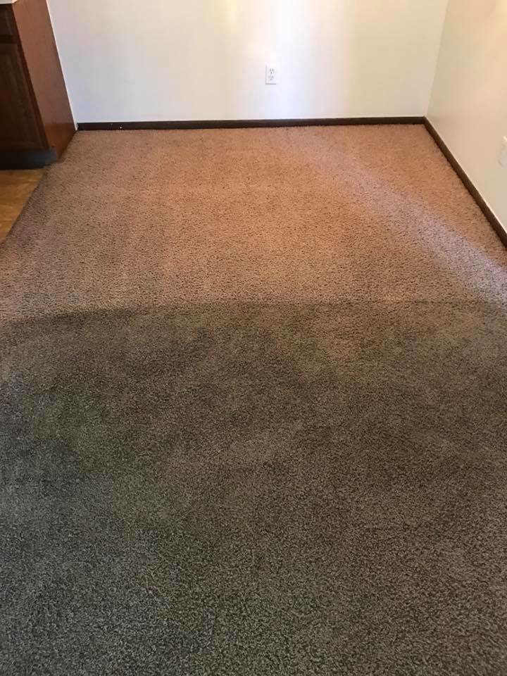 Carpet cleaning in progress, showing a clear before and after difference by Magic Wand Services in Wichita, KS