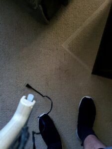 Carpet cleaning in progress with a cleaning wand by Columbia Flooring Group in Troutdale, OR