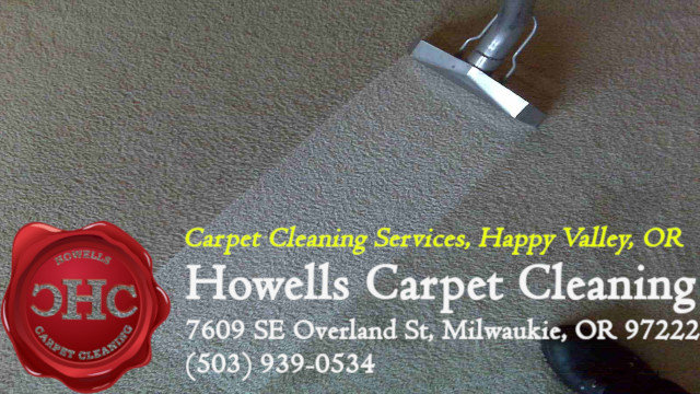 A carpet cleaning wand in action, showing a clean path on the carpet by Howells Carpet Cleaning in Milwaukie, OR.
