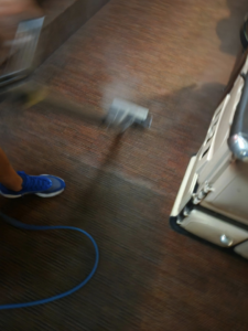 Carpet cleaning in progress with a professional wand by On The Spot Carpet and Upholstery Cleaning in Warren, MI.