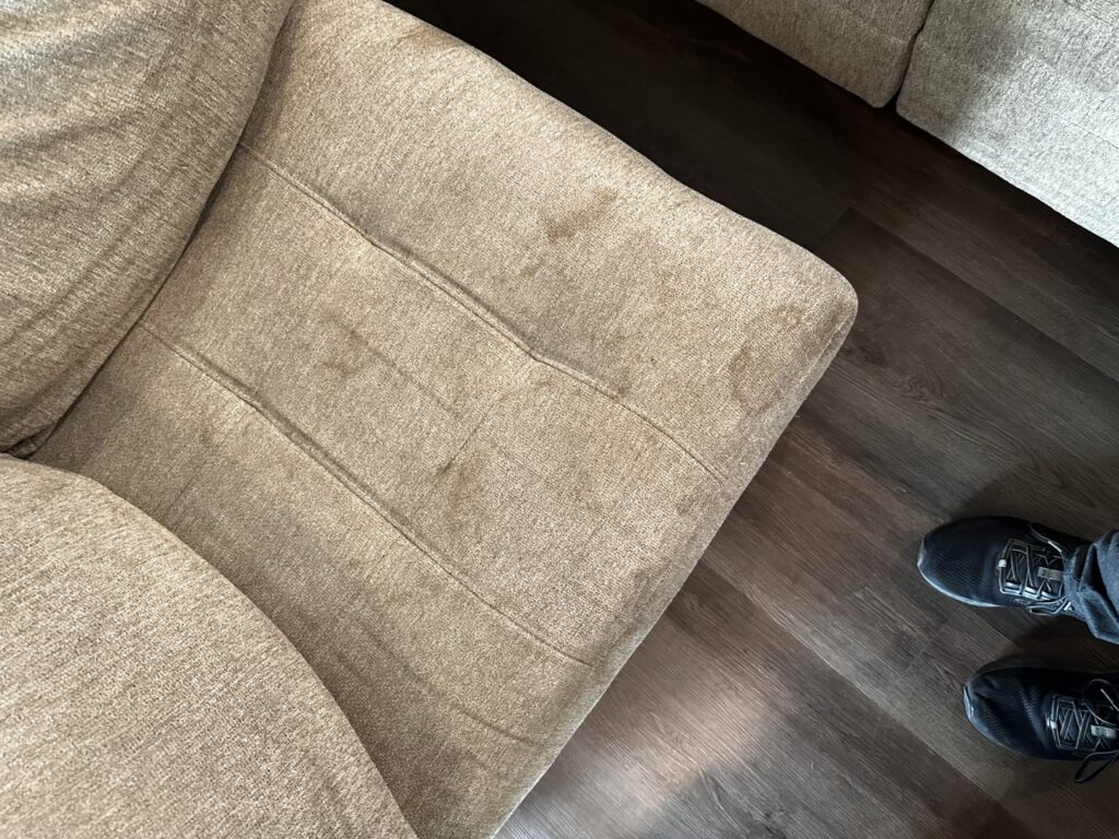 Professional carpet cleaning and janitorial equipment on a carpeted floor by Alpha Clean in Fort Wayne, IN.