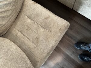 Professional carpet cleaning and janitorial equipment on a carpeted floor by Alpha Clean in Fort Wayne, IN.