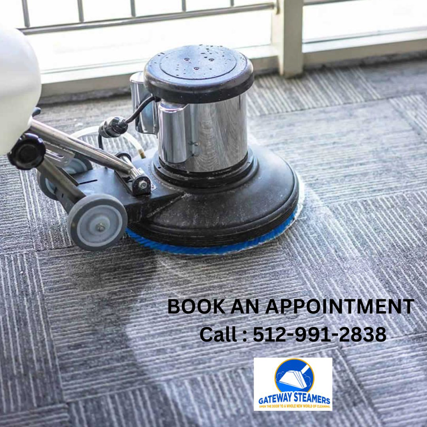 A professional carpet cleaning machine in action on a patterned carpet by Gateway Steamers in Austin, TX