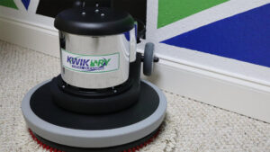 A professional carpet cleaning machine in use by Evansville Kwik Dry Total Cleaning in Evansville, IN.