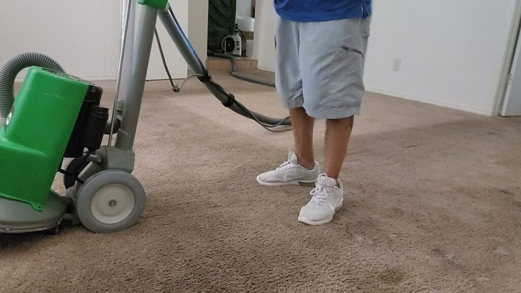 A professional carpet cleaning machine in operation during a job by Precision Chem-Dry Of DFW in North Richland Hills, TX.