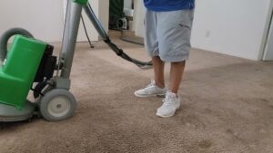 A professional carpet cleaning machine in operation during a job by Precision Chem-Dry Of DFW in North Richland Hills, TX.