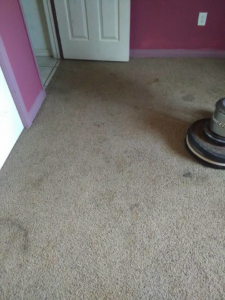 Carpet cleaning machine on a dirty residential carpet by Residential Carpet Cleaning in Bakersfield, CA.