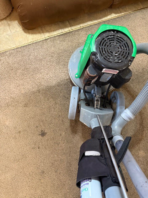 A Chem-Dry carpet cleaning machine in operation on a dirty carpet by Brooke's Chem-Dry Lawrence in Kansas City, MO.