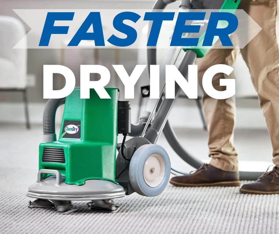 A professional operating a carpet cleaning machine for Klein Chem-Dry in Cedar Rapids, IA.