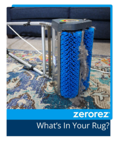 A carpet cleaning machine actively removing dirt and lint from a patterned rug by Zerorez Nashville, TN