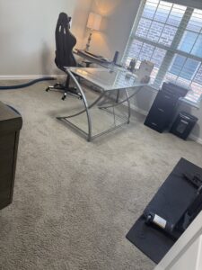 A clean carpet in an office room after professional cleaning by TLC Carpet Cleaning, Inc. in Lewisville, TX.