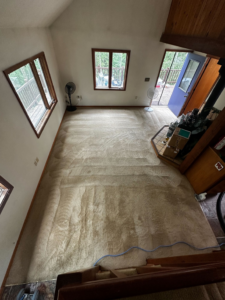 A room with freshly cleaned carpet showing distinct cleaning patterns by Alaska Floor Care Specialists in Fairbanks, AK.