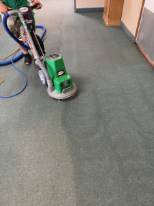 A professional carpet cleaning service in progress by Brooke's Chem-Dry Lawrence in Kansas City, MO, showing before and after.