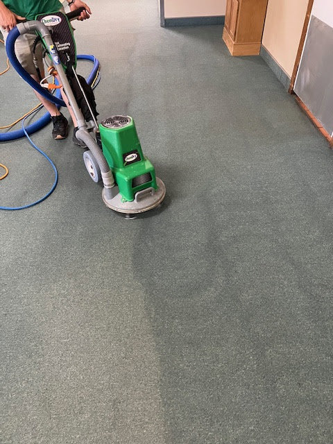 A professional carpet cleaning service in progress by Brooke's Chem-Dry Lawrence in Kansas City, MO, showing before and after.