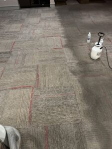 Cleaning solutions being applied to a commercial carpet during a cleaning service by Chem-Dry of Sioux Falls in Sioux Falls, SD.