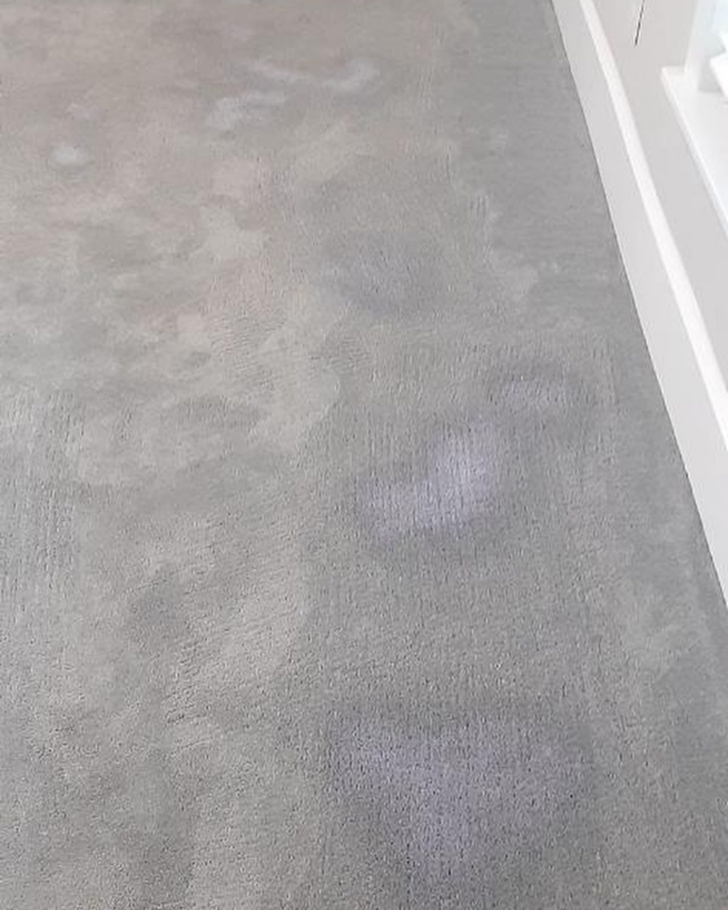 Close-up of carpet showing cleaning streaks from a professional carpet care job by Hughes Dry Professional Carpet Care in Marietta, GA.