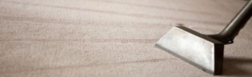 A carpet cleaning tool being used on a light-colored carpet by Capital City Cleaning & Restoration in Columbia, SC