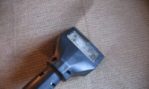 A Jason Lostetter Carpet Cleaning van parked outside a residential property for a cleaning service in New Glarus, WI.