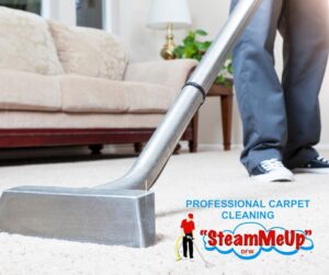 A carpet cleaning wand in use on a light-colored carpet in a living room by Steam Me Up Carpet Cleaning in Dallas, TX.