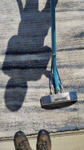 A professional carpet cleaning wand on a carpeted floor during a job by D&D Carpet Cleaning & Janitorial in West Columbia, SC