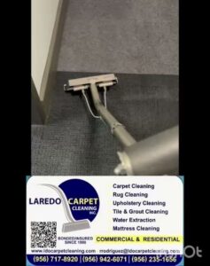 A carpet cleaning wand actively cleaning a grey carpet by Laredo Carpet Cleaning Services in Laredo, TX.