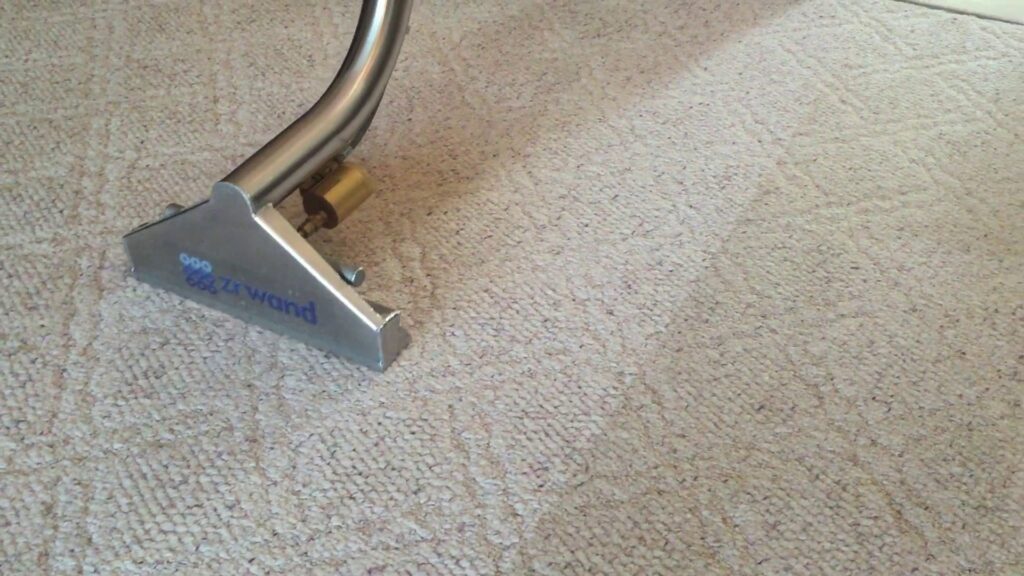 A Zerowand carpet cleaning tool in action on a light-colored residential carpet by Zerorez Nashville, TN