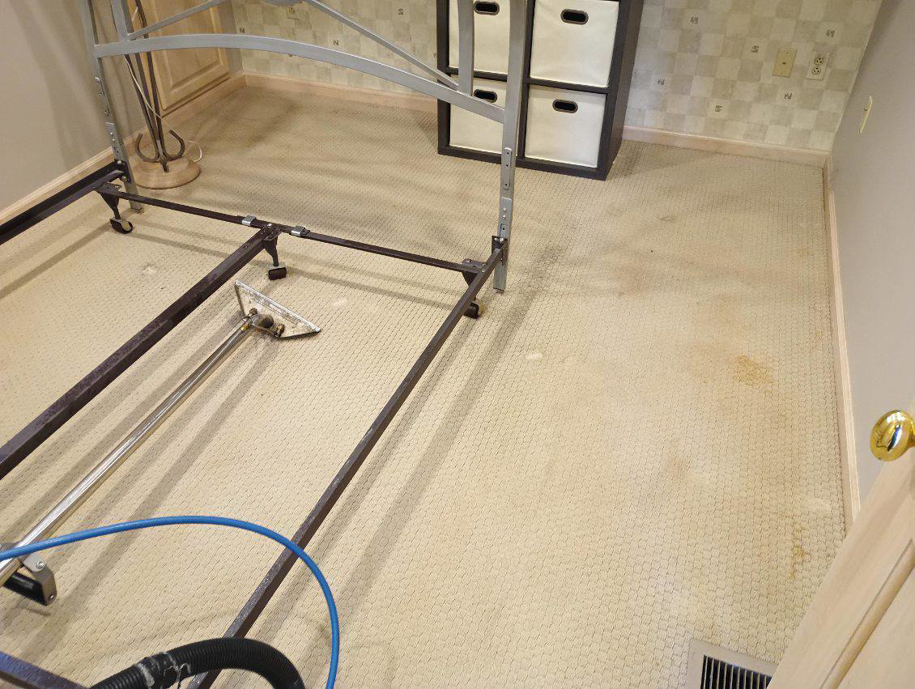 Carpet cleaning wand on a residential carpet during service by Rowland Brothers Carpet Cleaning Service in Morgantown, WV