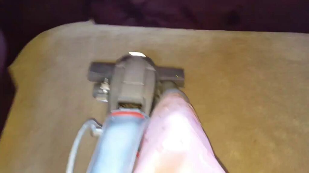 An overhead view of a vacuum cleaner actively cleaning a carpet by Howells Carpet Cleaning in Milwaukie, OR.