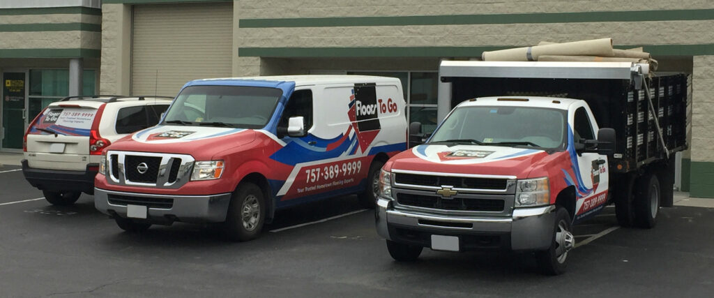 Floors To Go company trucks loaded with carpet rolls, ready for delivery and installation in Virginia Beach, VA.