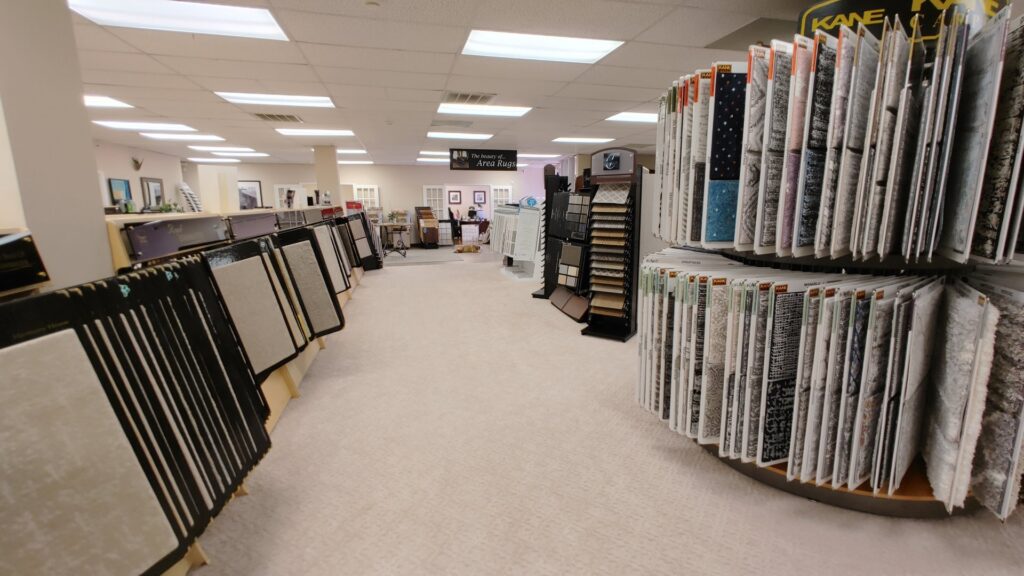 Various carpet displays and samples in the spacious showroom of All Surfaces Wholesale in Houston, TX.