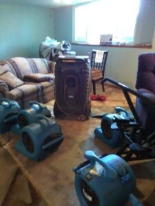 Carpet drying equipment used for water damage restoration by Givens Restoration in Wichita, KS