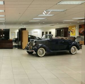 Close-up of a carpet edge and transition strip, showcasing professional installation by Ethan Fletcher in South Bend, IN.