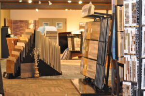 A selection of carpet flooring options displayed in the showroom at Warehouse Flooring in Great Falls, MT