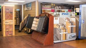 A wide selection of carpet and flooring samples displayed in the showroom of InVision Construction in Pearl, MS.