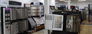 Interior view of the carpet and flooring showroom at TJS Floorcovering in Pennsauken, NJ, displaying various samples.