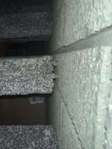 Close-up detail of professional carpet installation on a staircase by Carpet Warehouse Lorain LLC in Lorain, OH.
